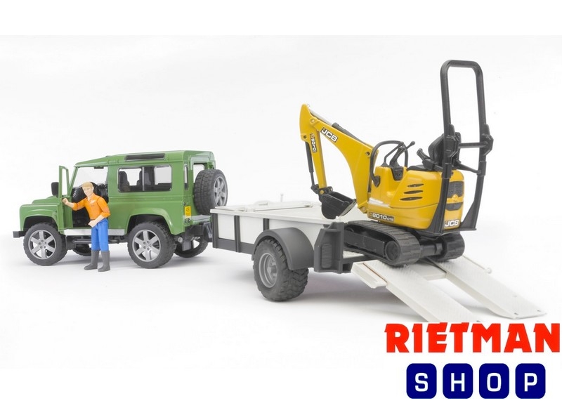 Land Rover Defender met trailer, JCB mic