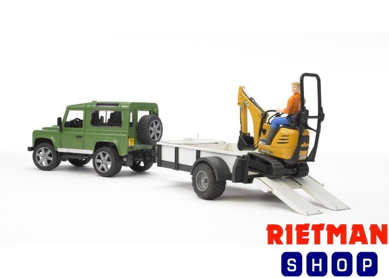 Land Rover Defender met trailer, JCB mic